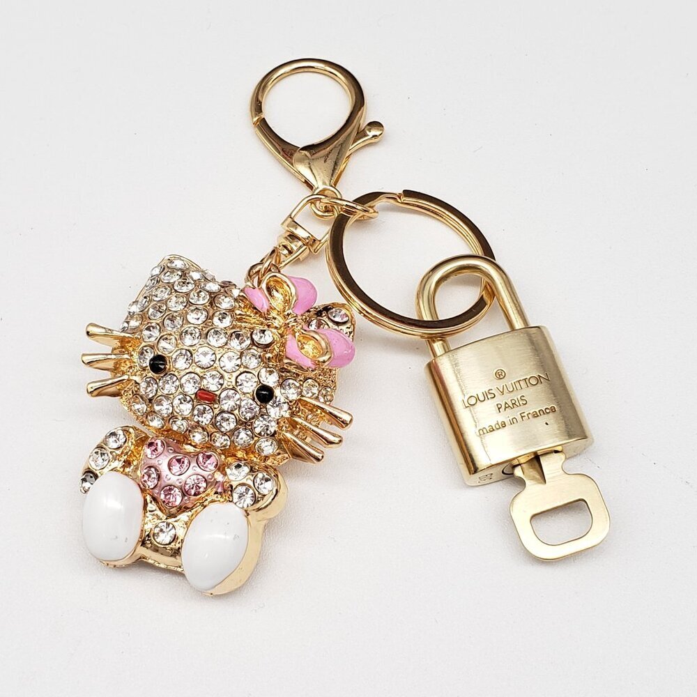 Louis Vuitton Gold Lock 🔒 Authentic LV Key + Unbranded Hello Kitty Bag Charm - Picture 2 of 8